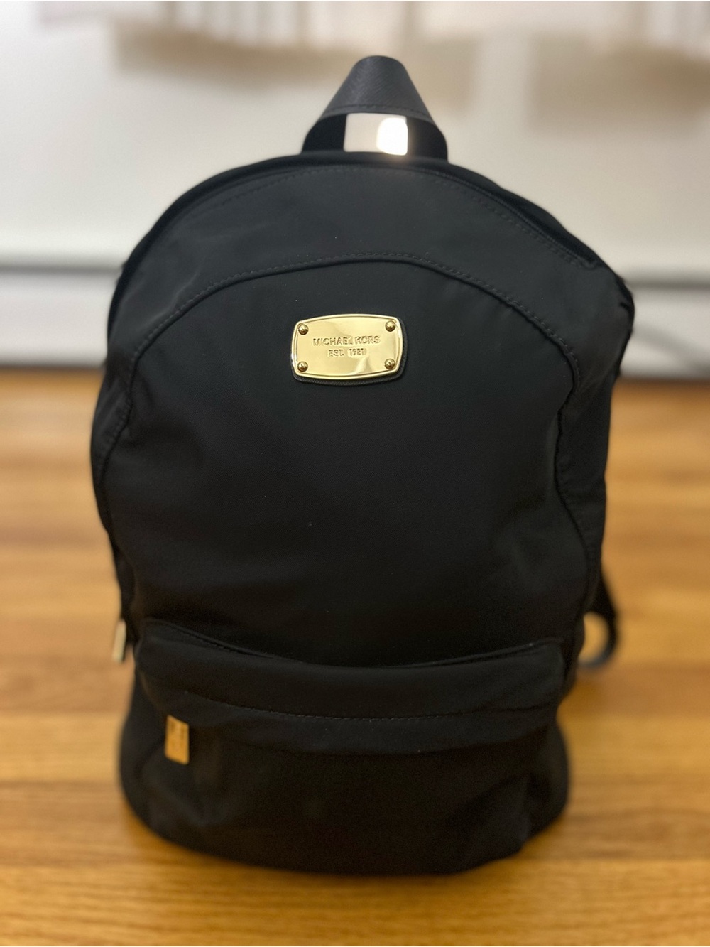 Michael Kors Black Backpack with Gold Plaque